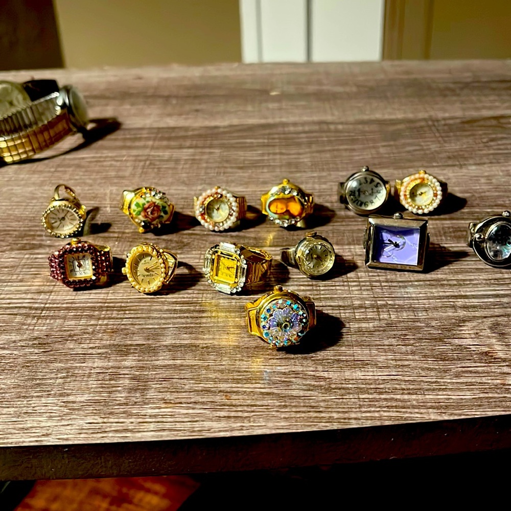 13 women’s ring watches.